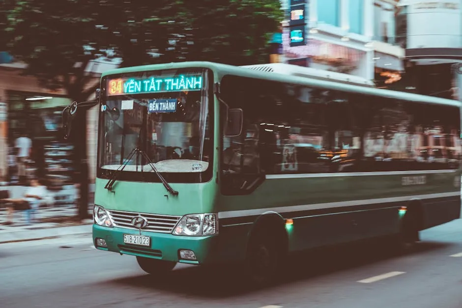 Sleeper bus on a highway crossing Central Vietnam at dusk