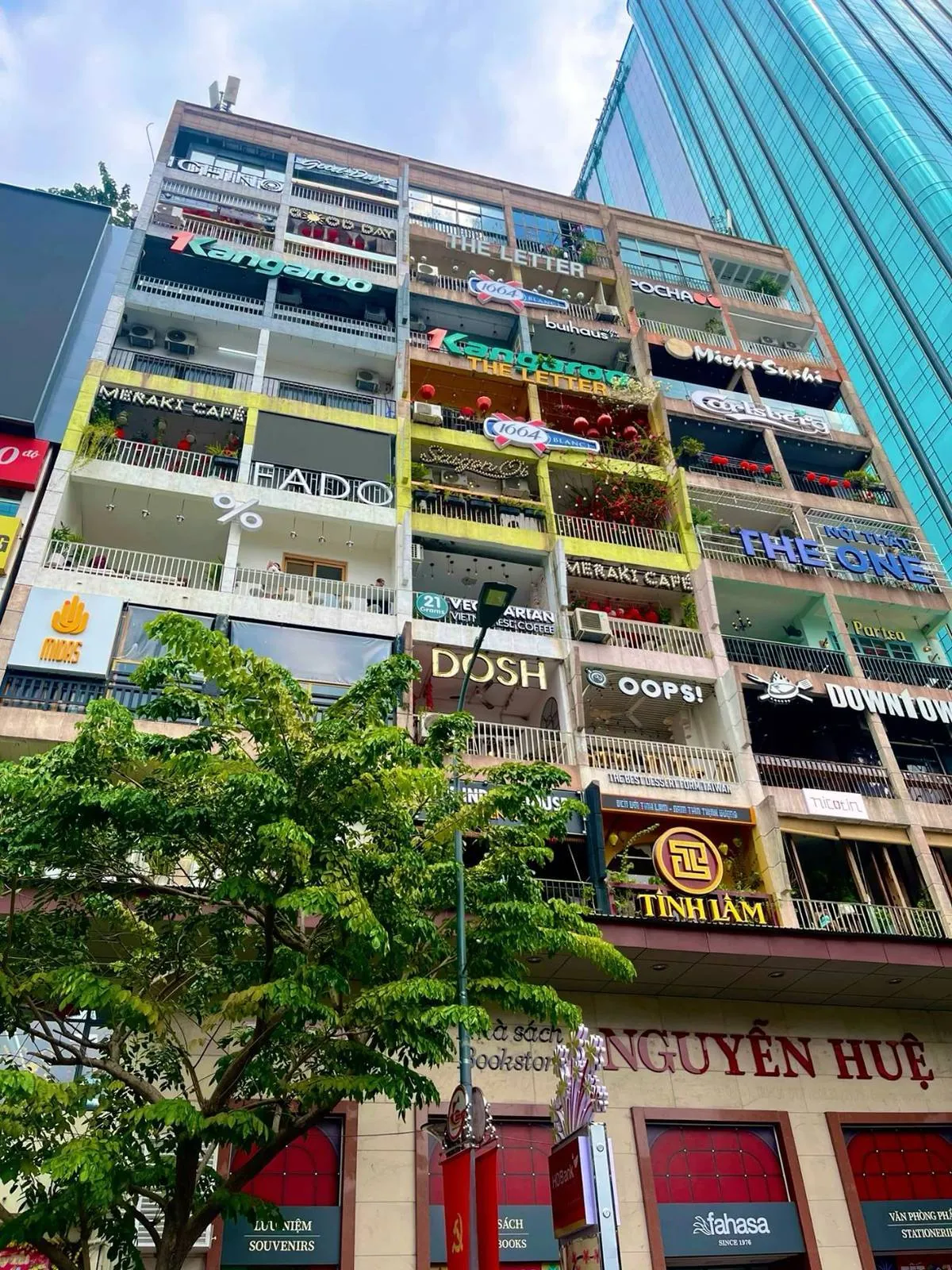 Commercial building signage along Nguyen Hue Walking Street in District 1