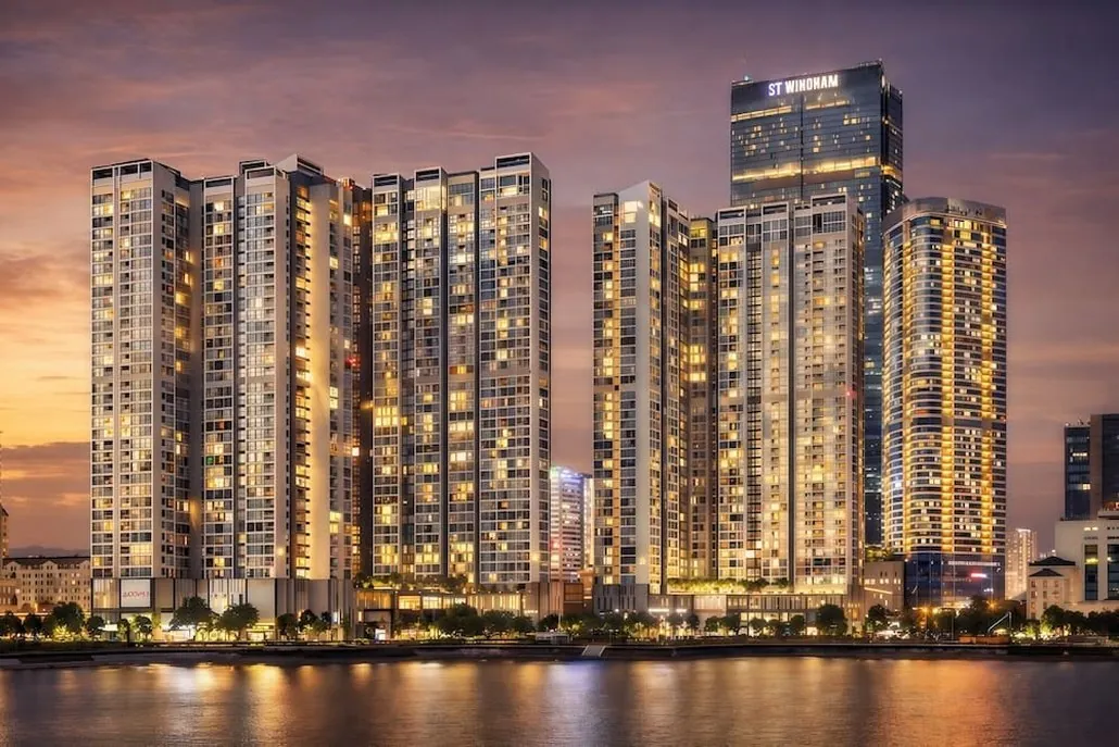 High-rise riverside apartment towers in Ho Chi Minh City at night
