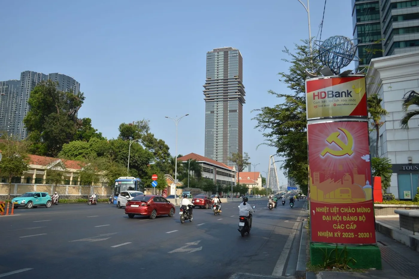 A bank branch storefront on a busy Vietnamese city street