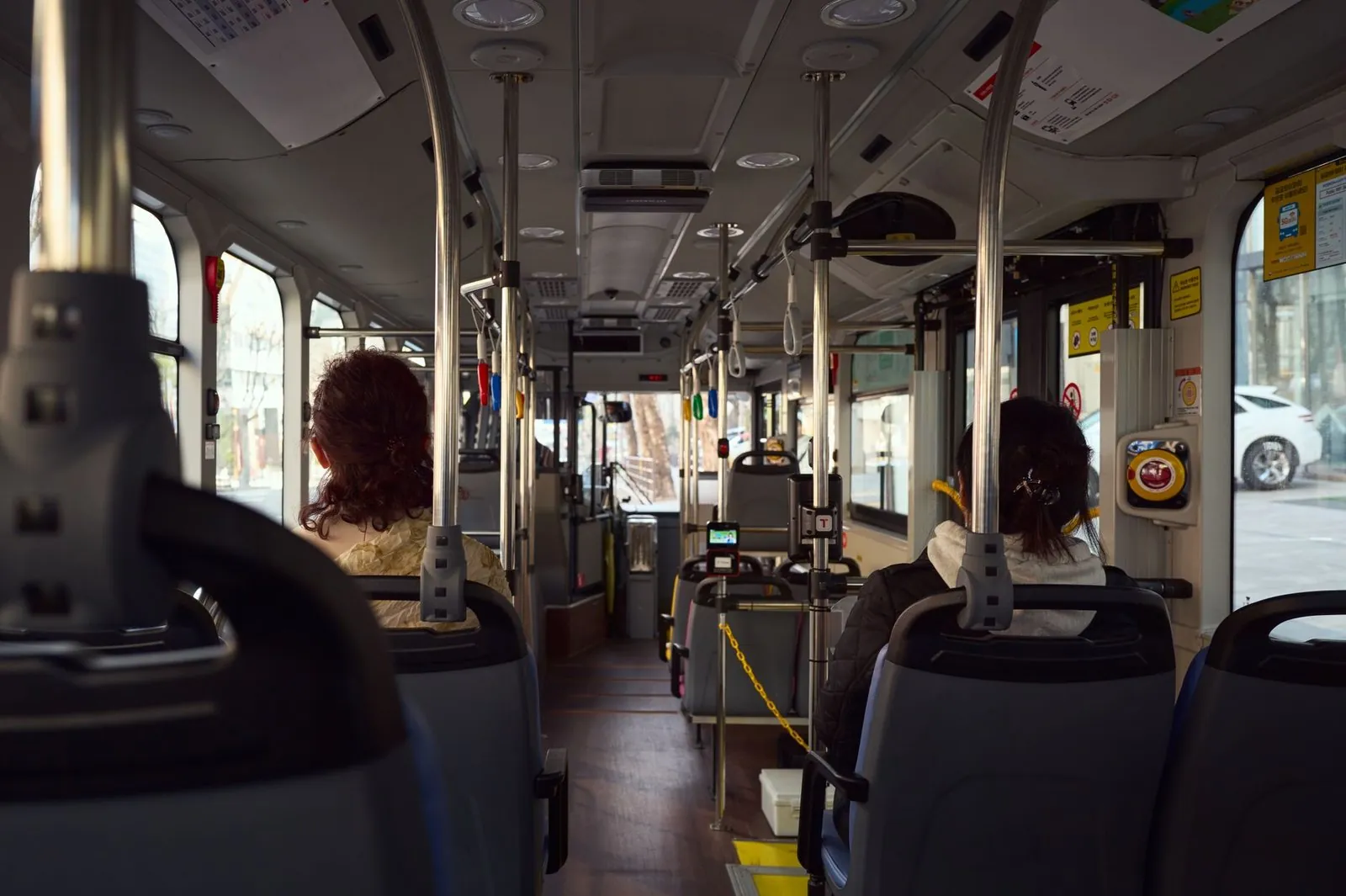 Inside a Vietnamese public bus with seated passengers