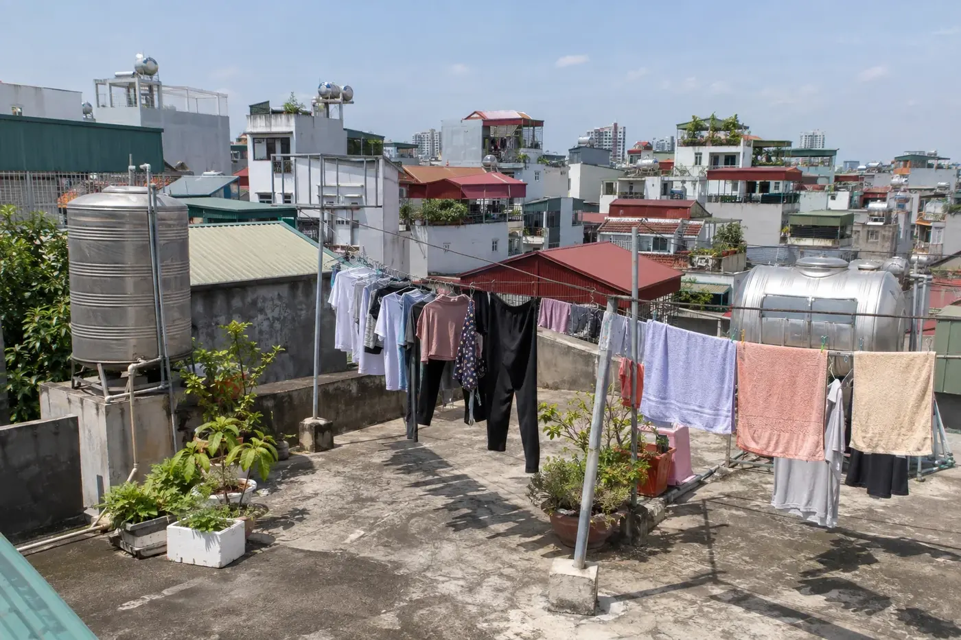 Laundry drying on a sunny rooftop line