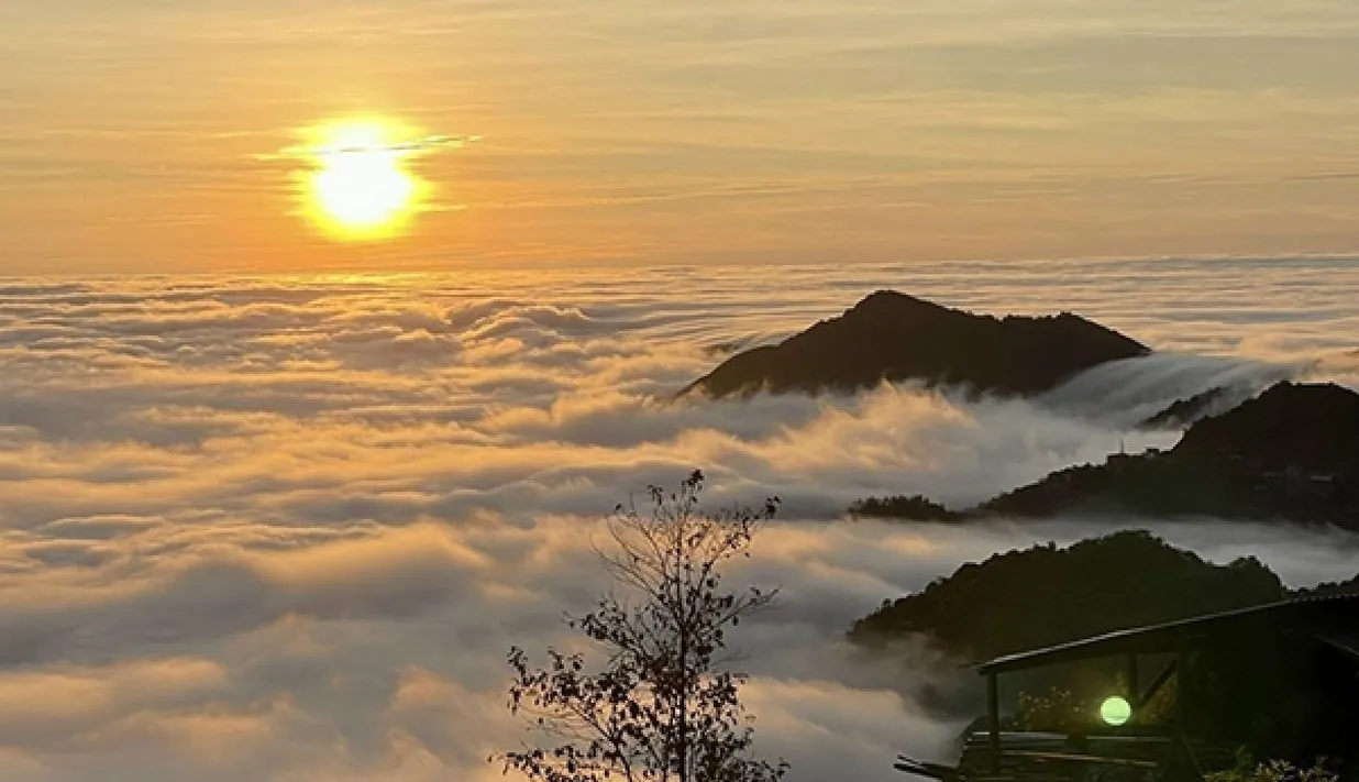 Sunset over misty mountains in central Vietnam