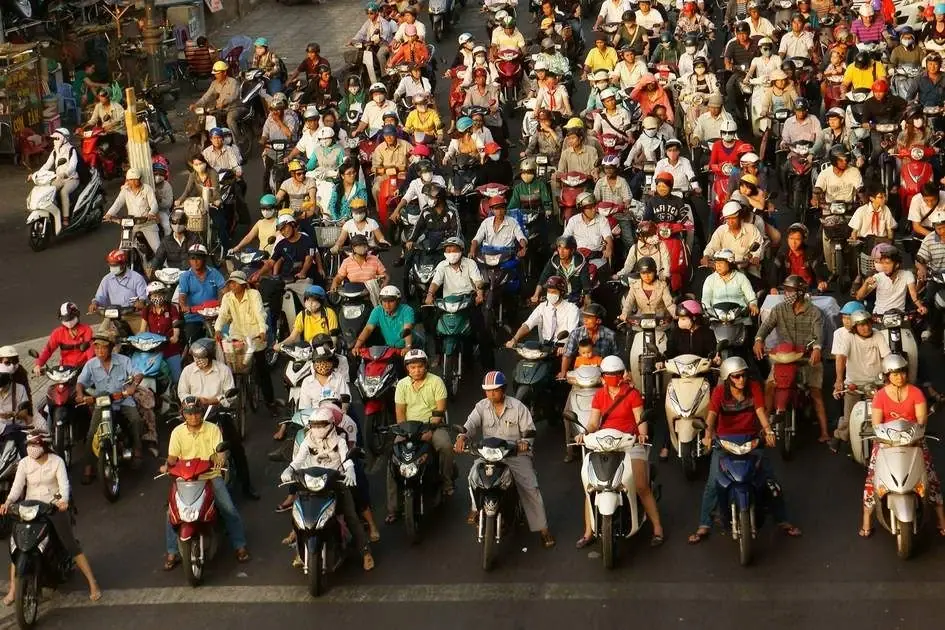 Motorbike traffic on a busy Ho Chi Minh City street