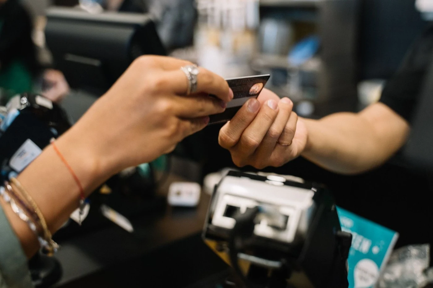 Paying by card at a checkout counter