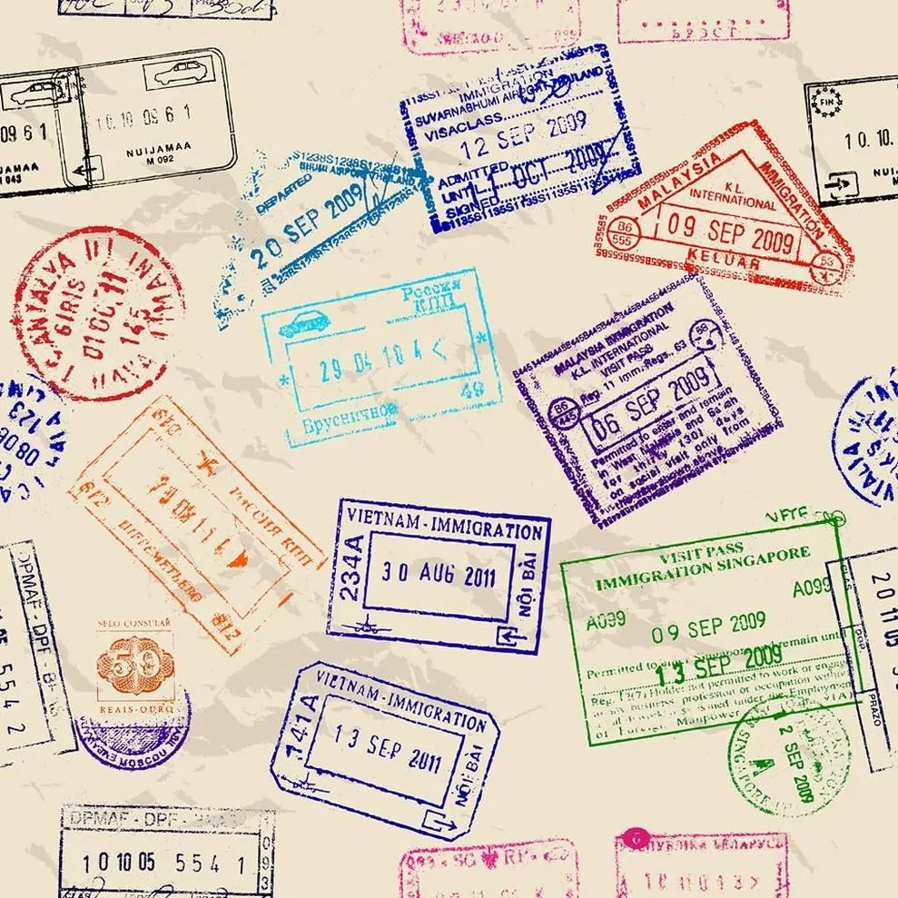 Colorful visa and entry stamps in a passport, similar to what you get crossing at Lao Bao