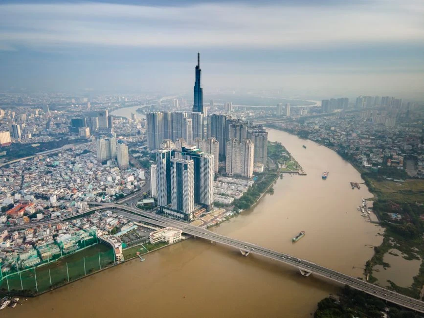 Ho Chi Minh City skyline from above with river and modern buildings