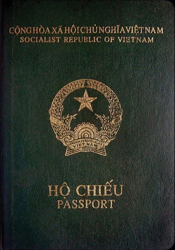 Worn dark green Vietnam passport cover with the national emblem