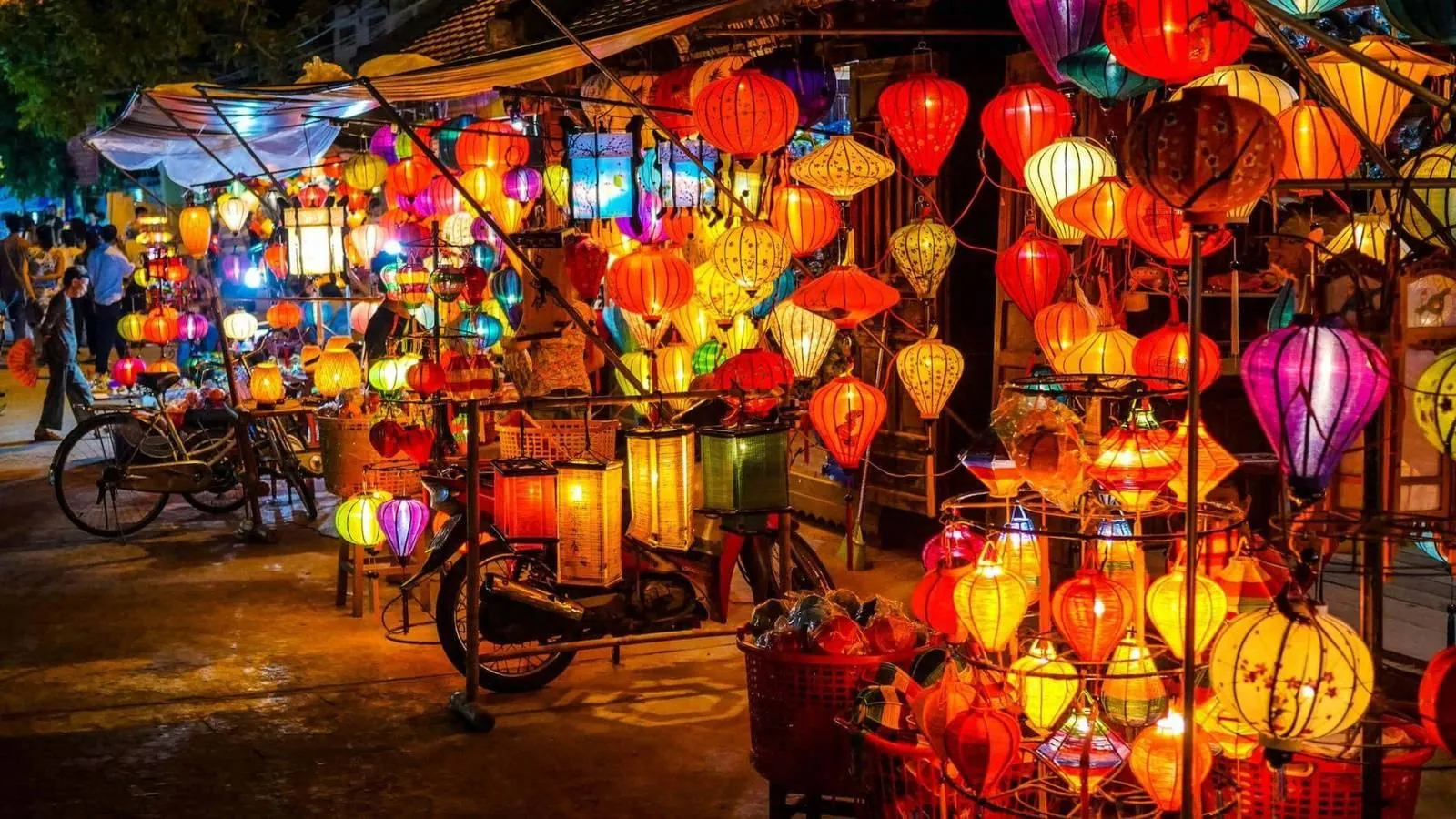 Evening lantern market in Vietnam with colorful paper lanterns lit up