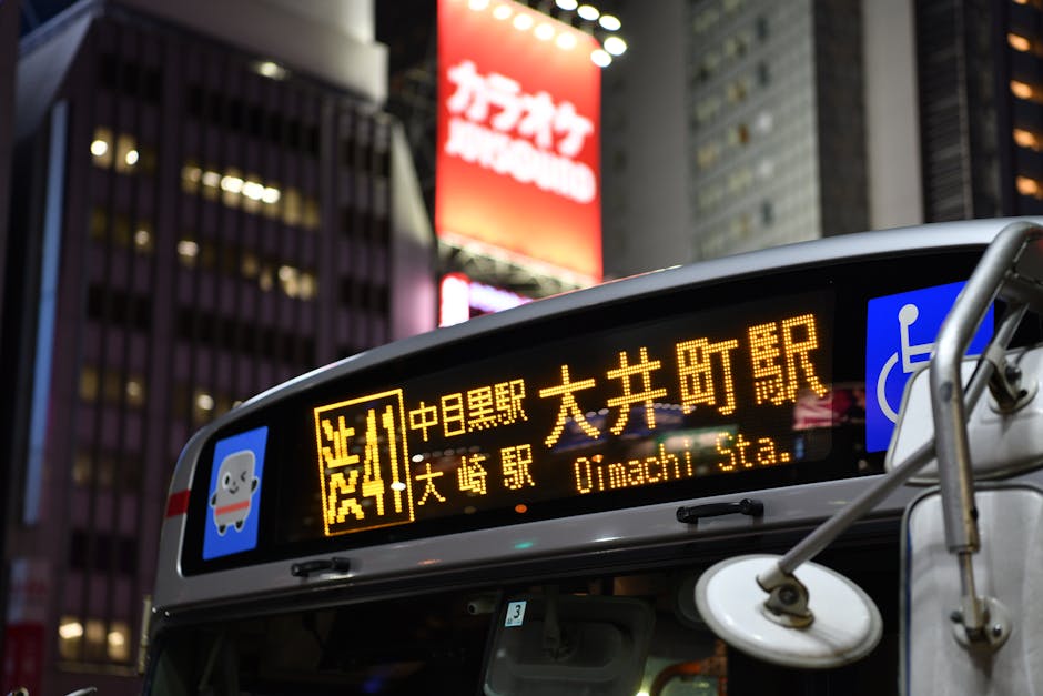 Bus station at night with passengers waiting to depart