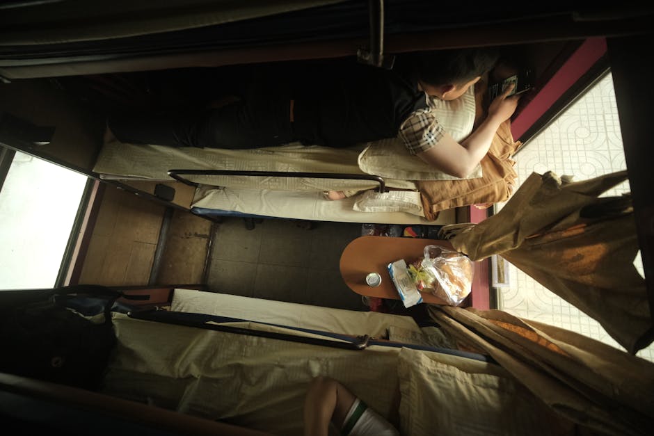 Sleeper bus bunk beds — top view of passengers resting overnight