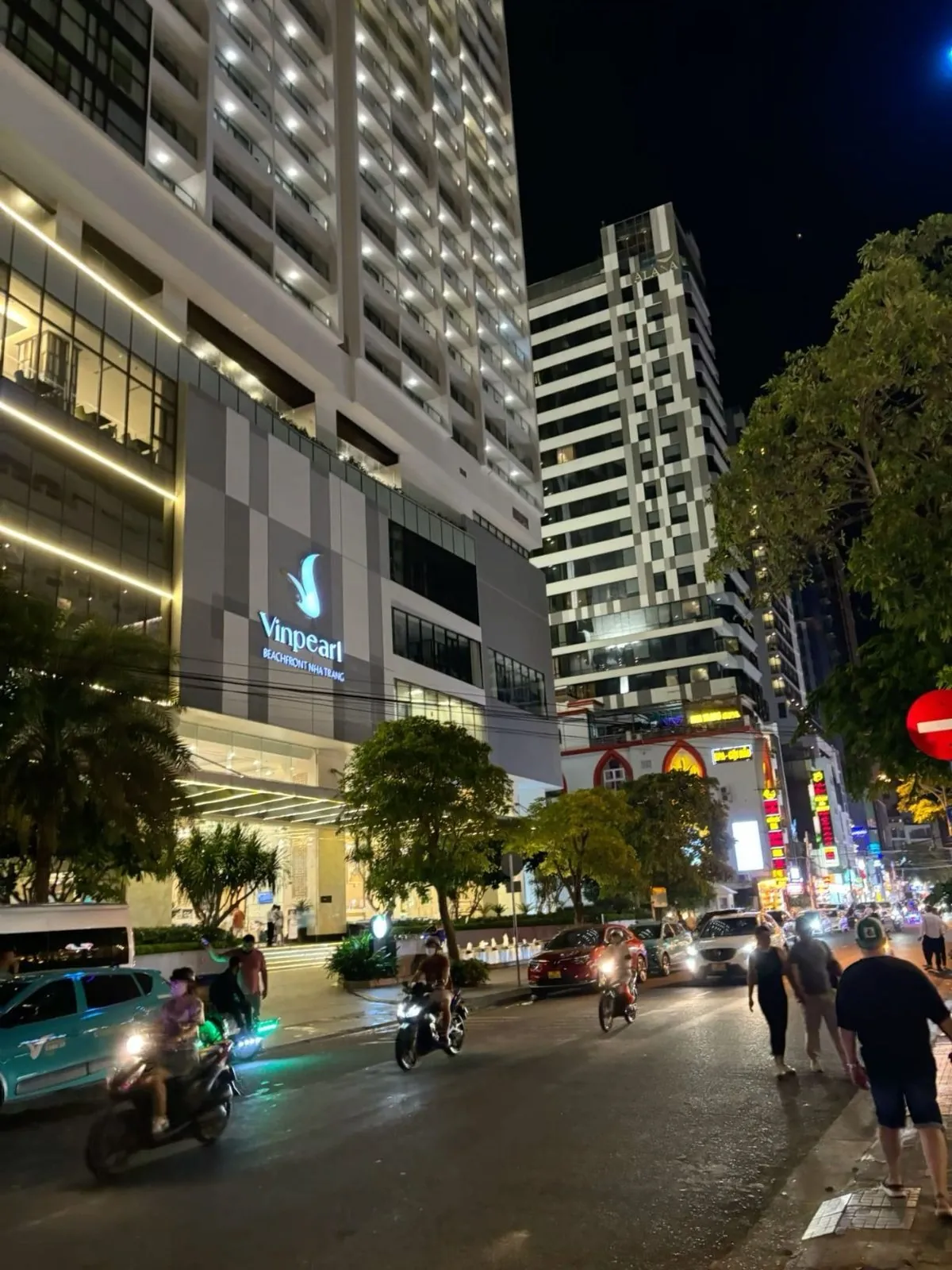 Night street traffic outside the Vinpearl hotel tower in Nha Trang