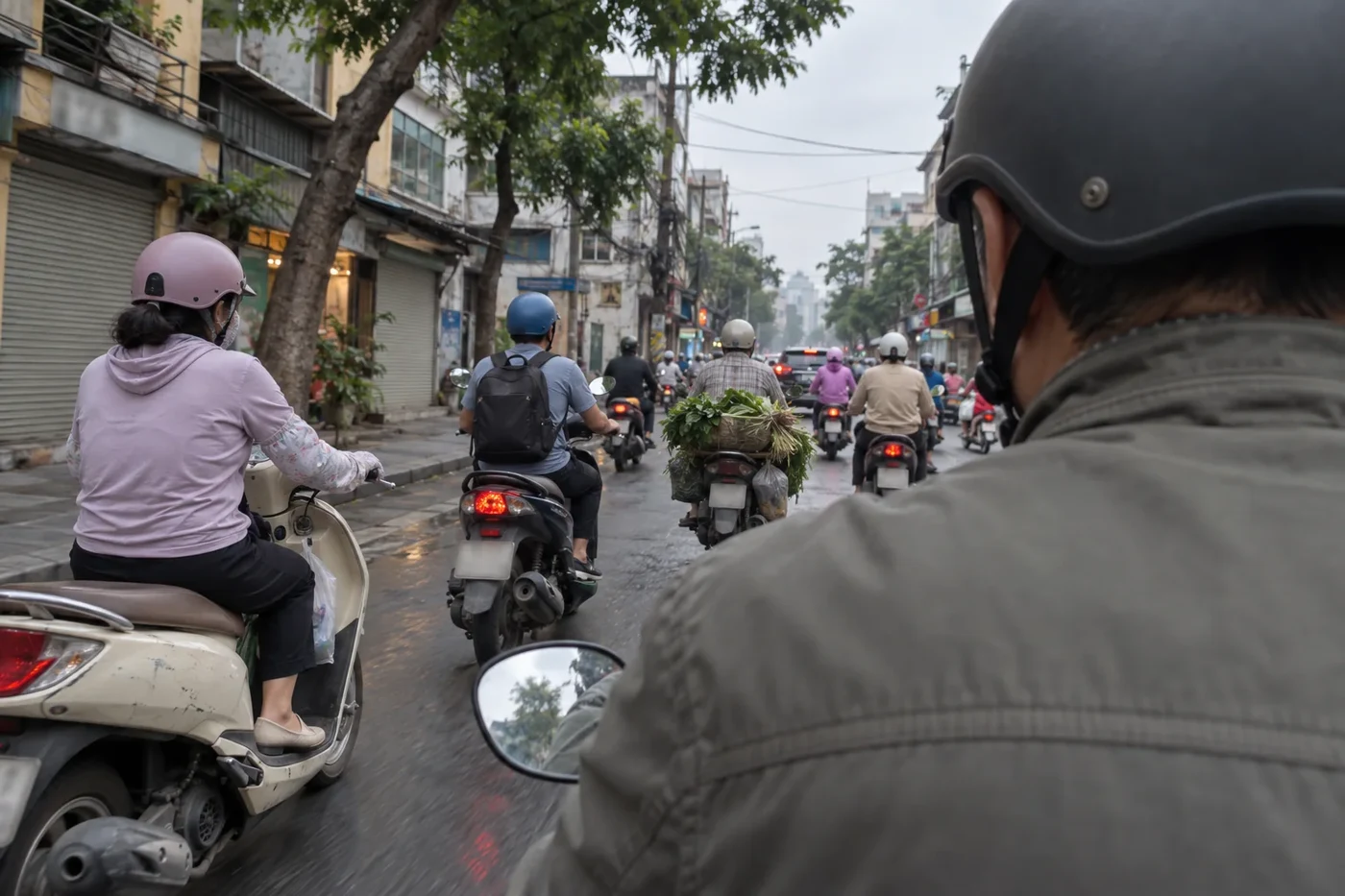 A passenger on the back seat of a motorbike taxi