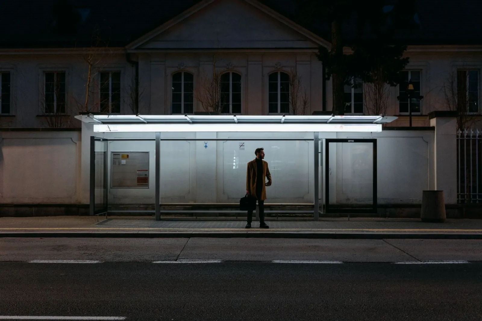 Waiting for a night bus at the station