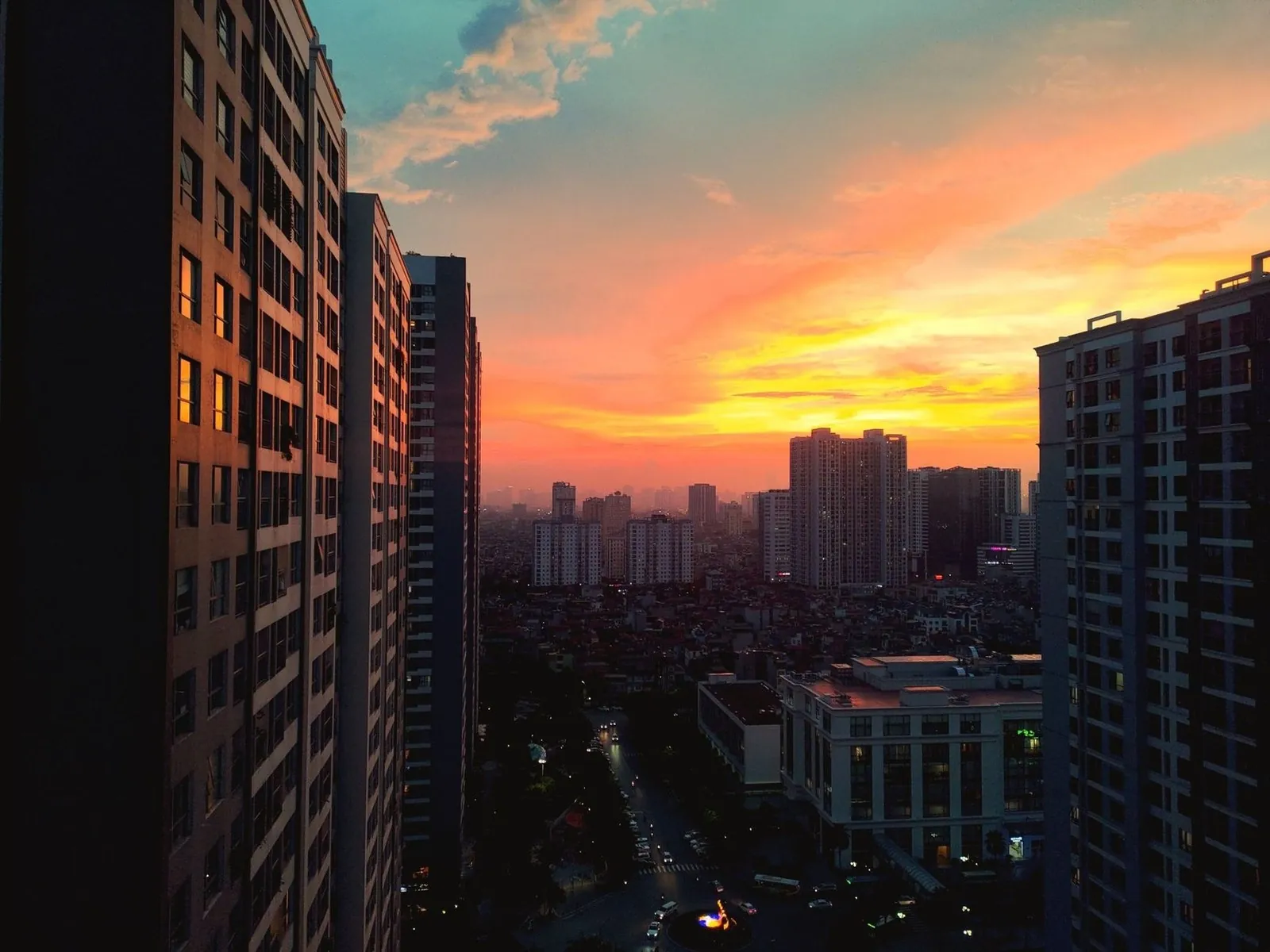 Hanoi city skyline with apartment towers at sunset
