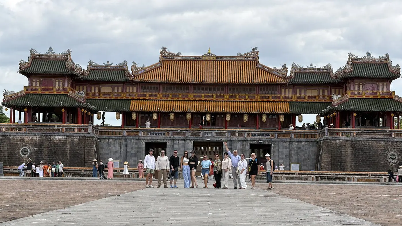 Group of travellers in front of the Ngo Mon gate of the Hue Imperial City