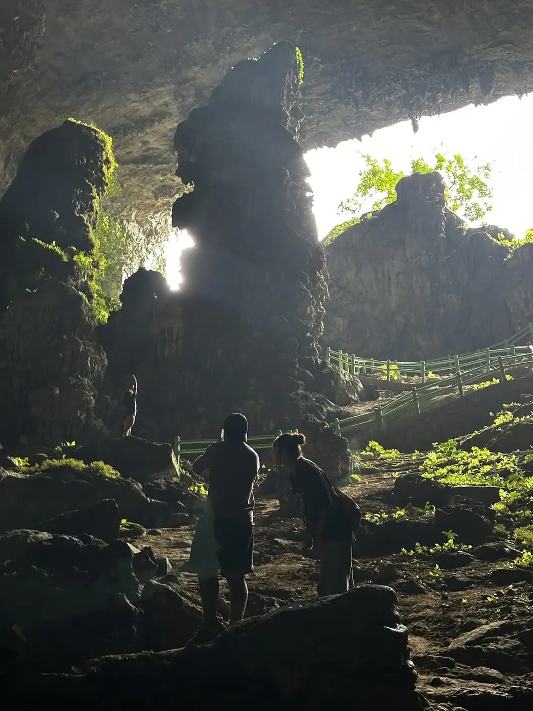 Travelers exploring a cave near Da Nang, Vietnam