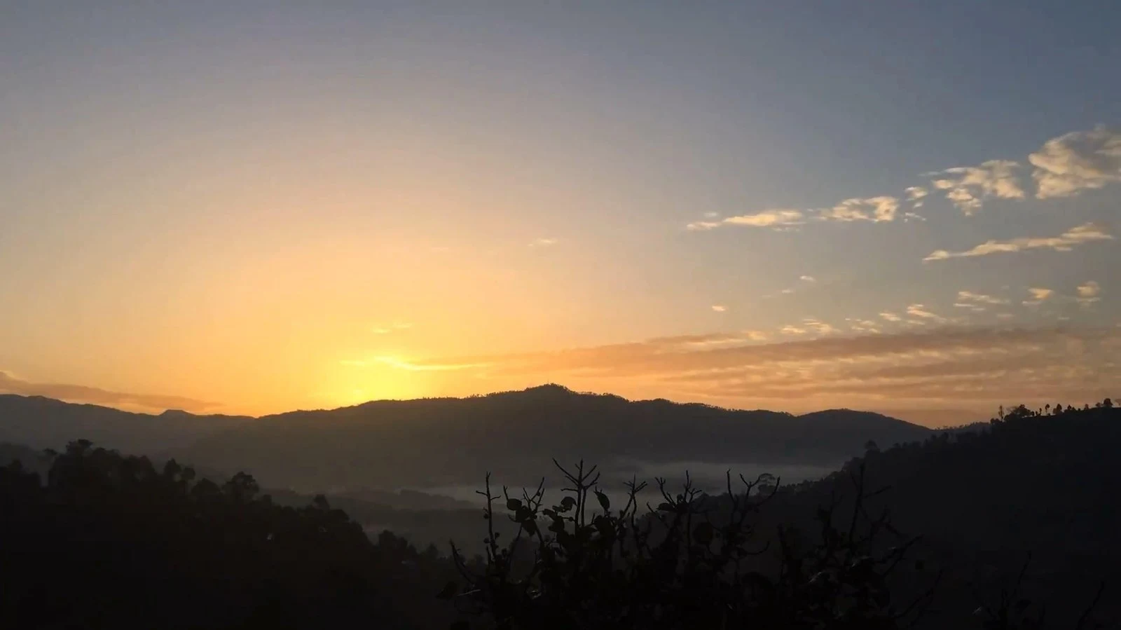 Misty mountain sunset in central Vietnam highlands