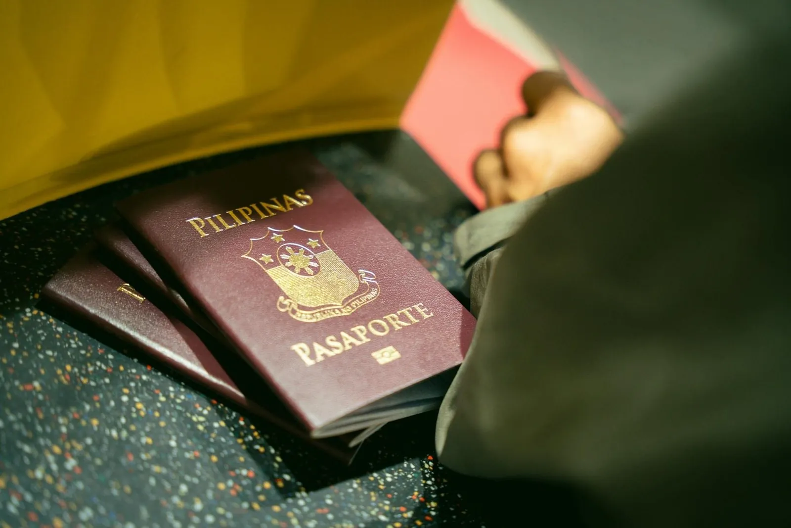 Passports at a check counter - the only thing standing between you and re-entry