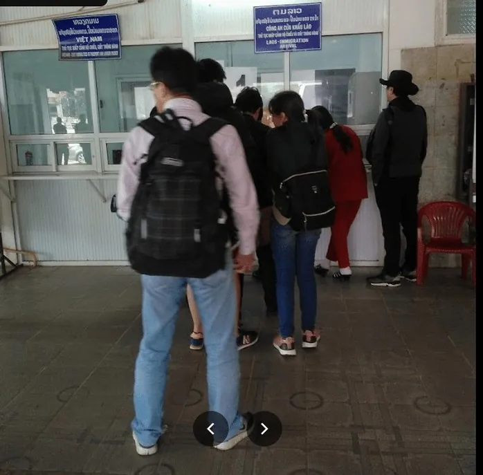 Travelers waiting in the immigration queue at the Lao Bao border