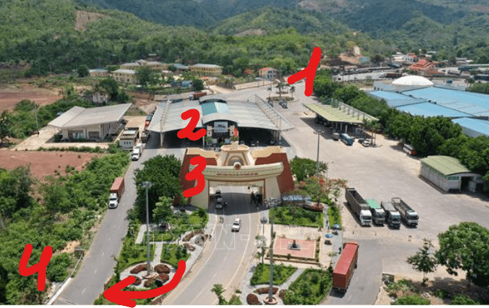 Aerial view of the Lao Bao border checkpoint with marked exit and entry windows