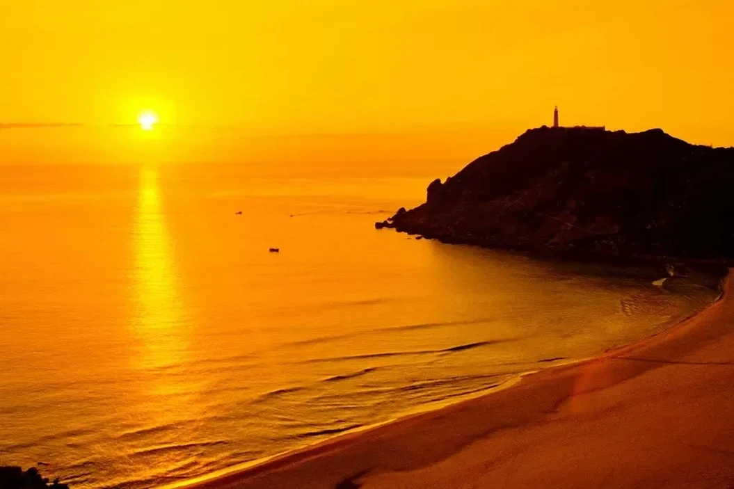 Sunset over the coast near a Vietnamese beach town