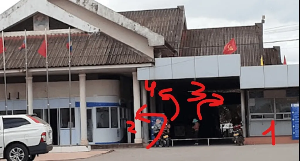Laos immigration building with numbered booths