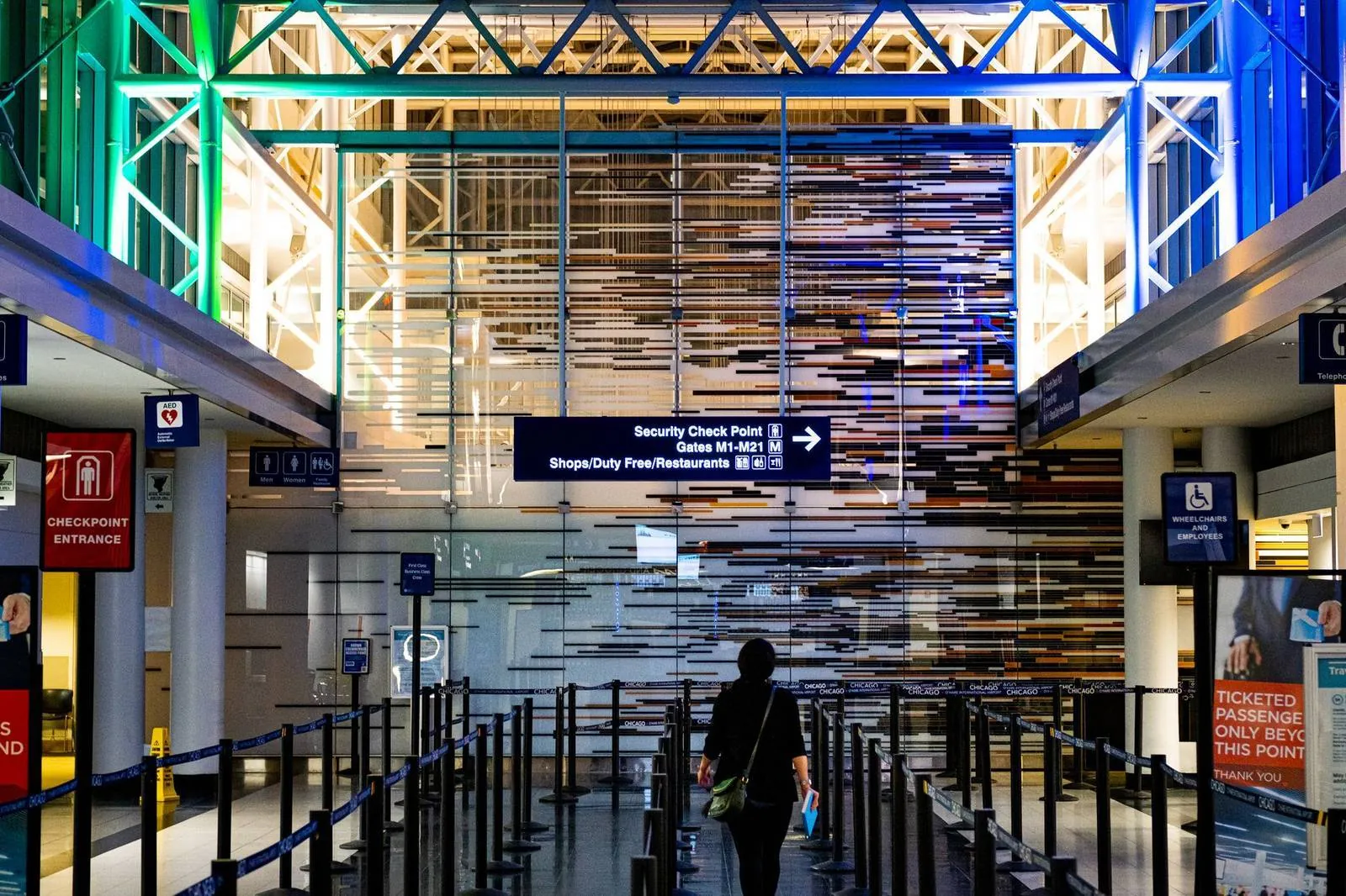 Security checkpoint signage at a US airport departure terminal