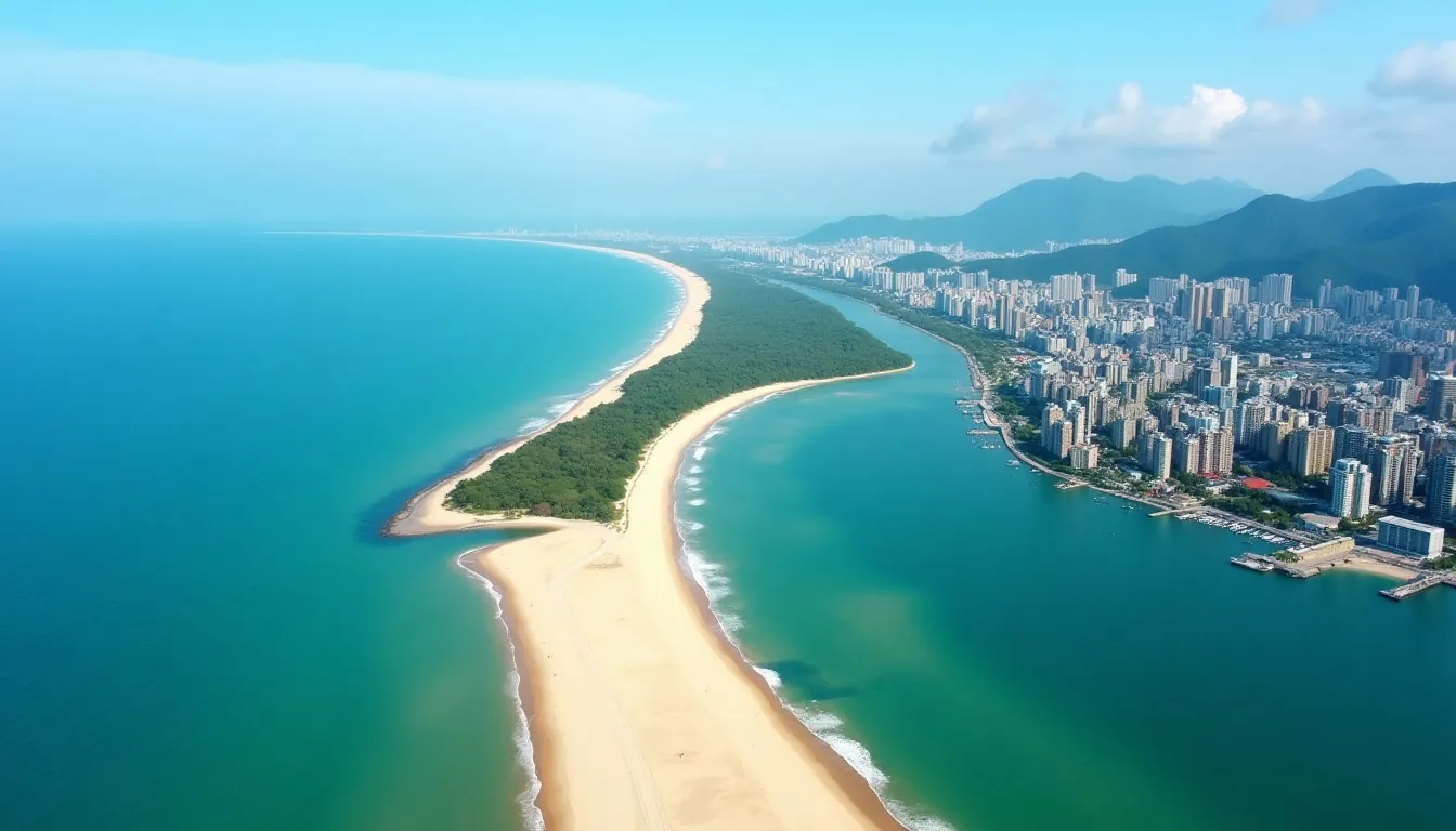 Aerial view of a Vietnamese coastal city and curved sandy beach