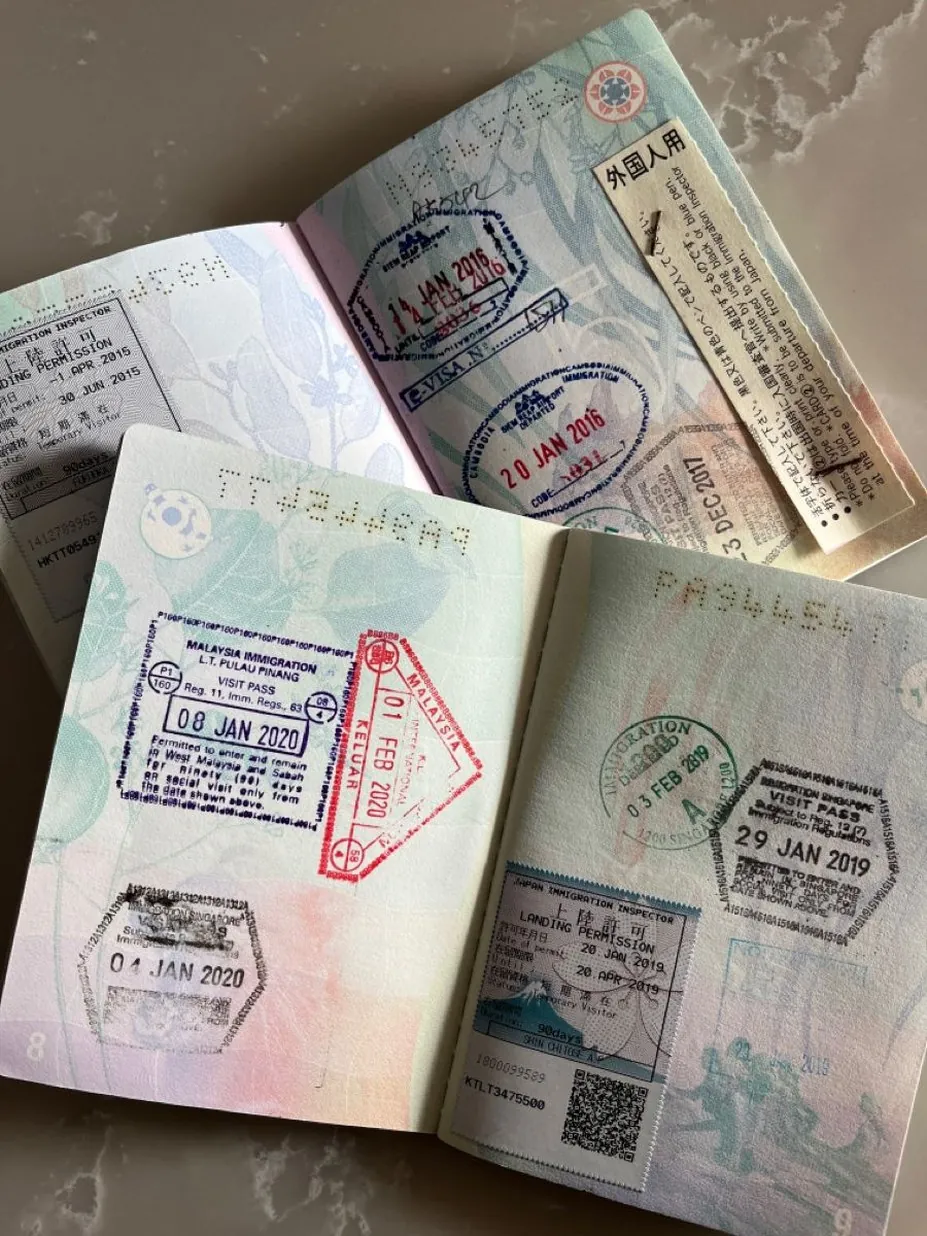 Uzbek passport with a Vietnam e-visa printout ready for the airport