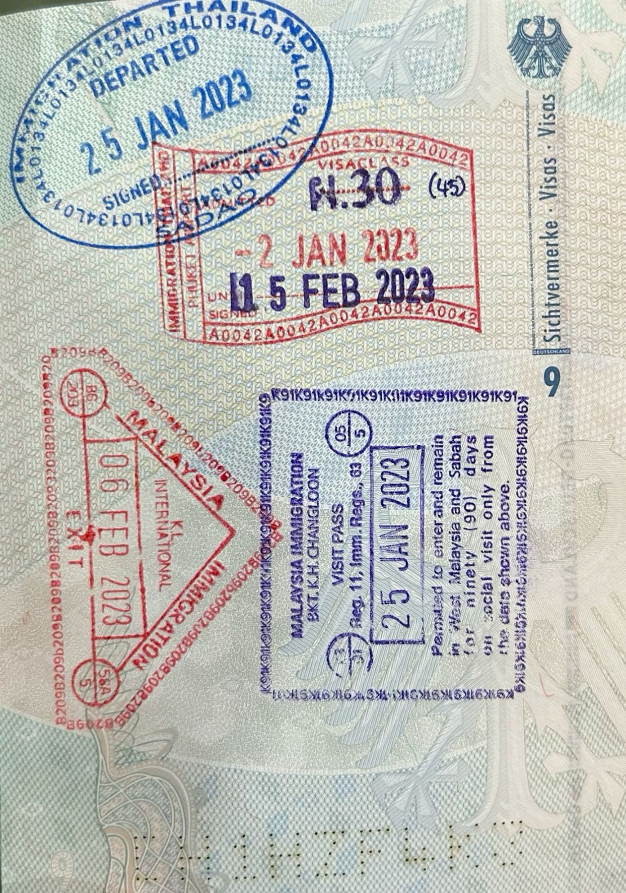 Passport with Southeast Asia entry and exit stamps