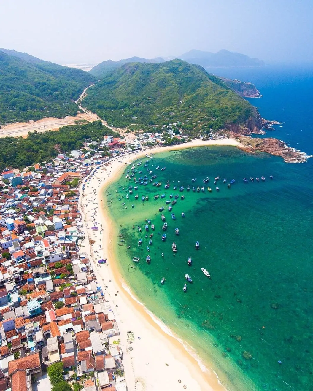 Aerial view of a resort town and bay in Vietnam