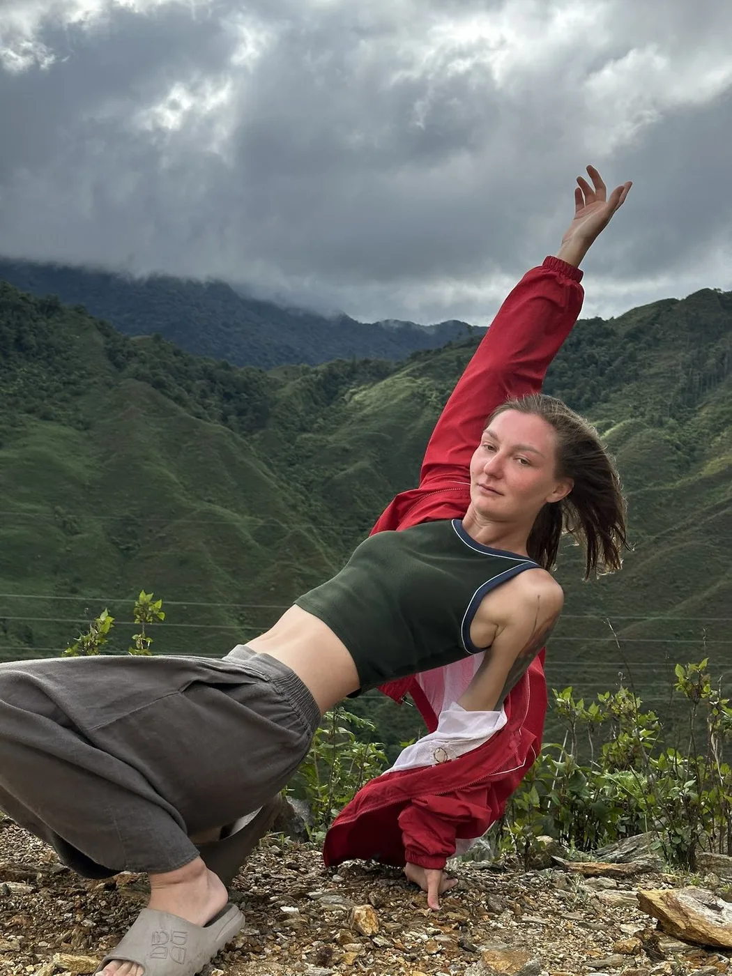 Traveler posing on a mountain viewpoint in Moc Chau, northern Vietnam